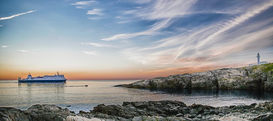 A Marine Atlantic ferry is arriving at the shores of the island of Newfoundland.