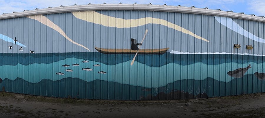 A mural paying homage to Inuit life at Frank’s General Store in Makkovik.