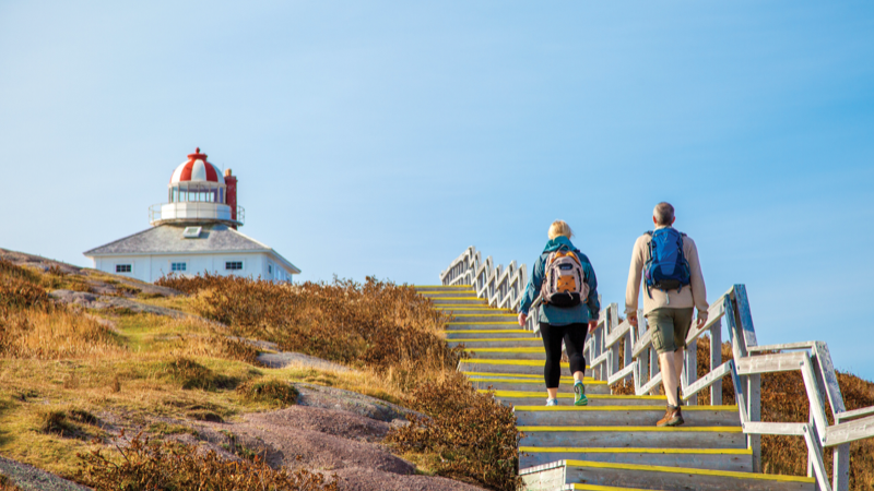 Travellers taking the stairs up to the Cape Spear Lighthouse.